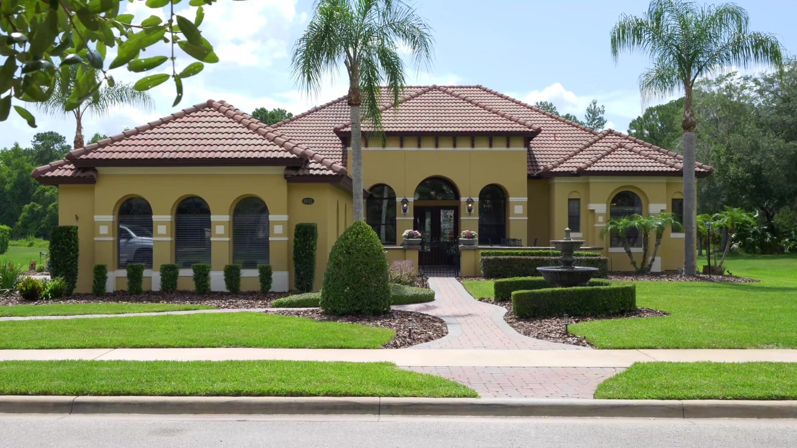 Front elevation of a Mediterranean-style luxury home in Sanford, FL that went under contract in one day
